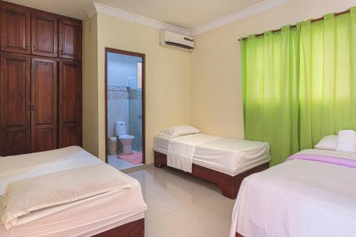 Corales del Sur Apartment | 1-Bedroom Apartment with 3 Beds Private Balcony Near SDQ Airport Fast Wi-F