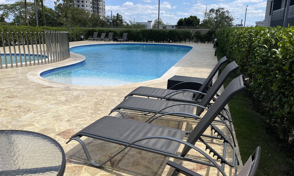 Punal Apartment | 10Min. Del Aeropuerto apt.picina aire wifi 24H seguridad patio de juegos parqueo