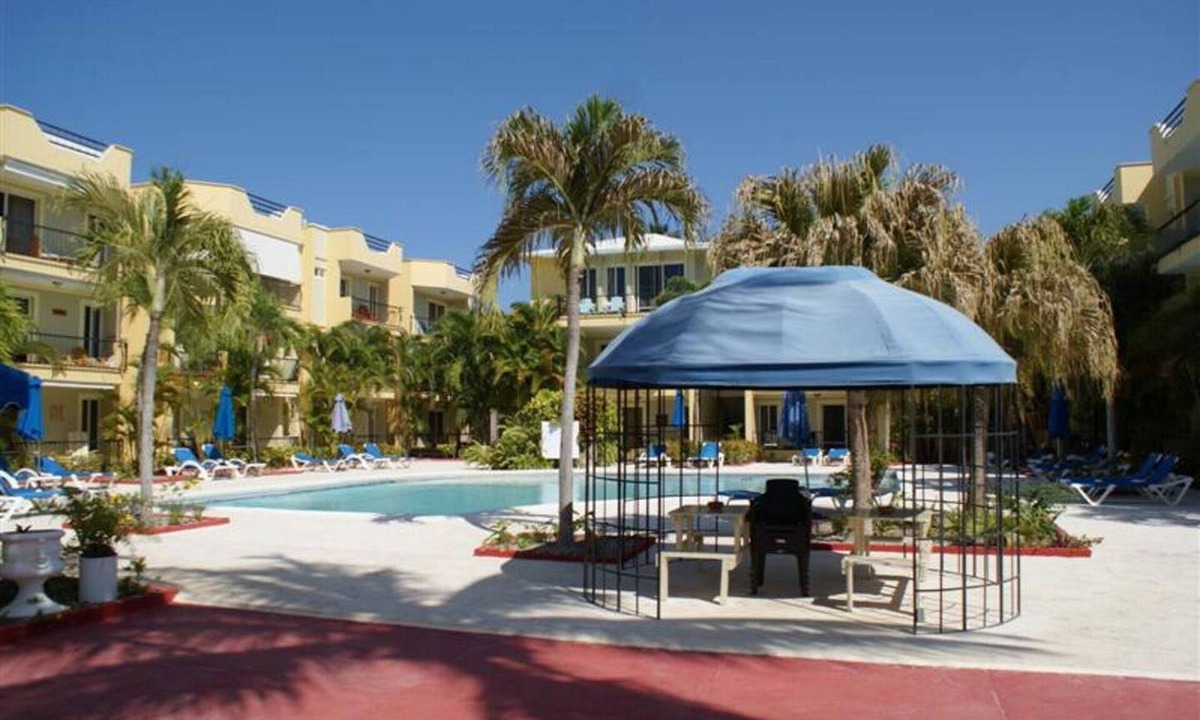 El Batey Apartment | 2BD condo in downtown Sosua, pool/TV/Wi-Fi, near beach/clubs, guest-friendly