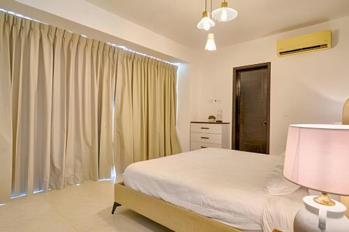 Juan Dolio - El Pueblo Apartment | 2Bdrm Apt. Front Juan Dolio Beach Access| Pool+BBQ