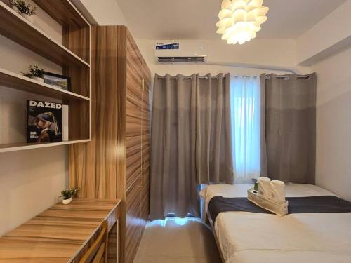 Highway Hills Apartment | Citispace 1BR Condotel Suite at FAME Residences #FM14A
