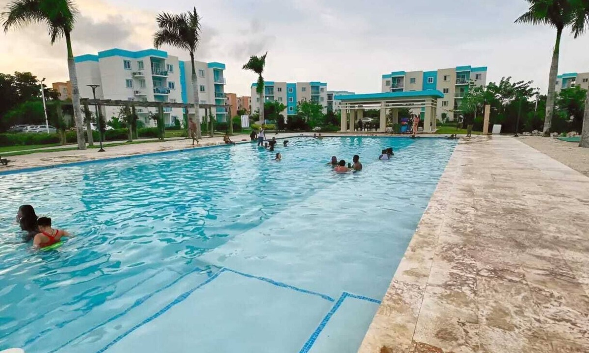 Veron Apartment | Cozy 2BR Retreat w/Pool, WiFi, Parking – Minutes to Beach