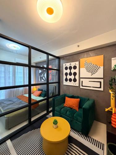 Highway Hills Apartment | Elevated retro condo near BGC, Makati, and Ortigas