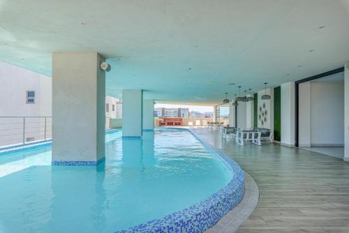 La Julia Apartment | Escape Apartments, Balcony, Pool, Gym & Spa in La Julia