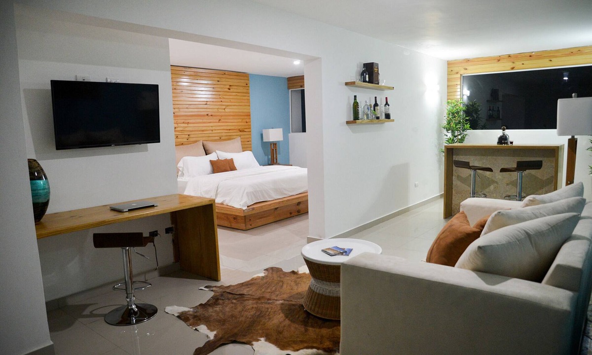 Villas Ana Maria Hotel | Guest-friendly Luxury hotel room in central Sosua, with private bar