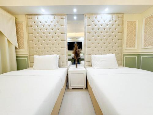 Legazpi Village Apartment | Homefort Twin Bed Suite - Red Residences Makati 1146