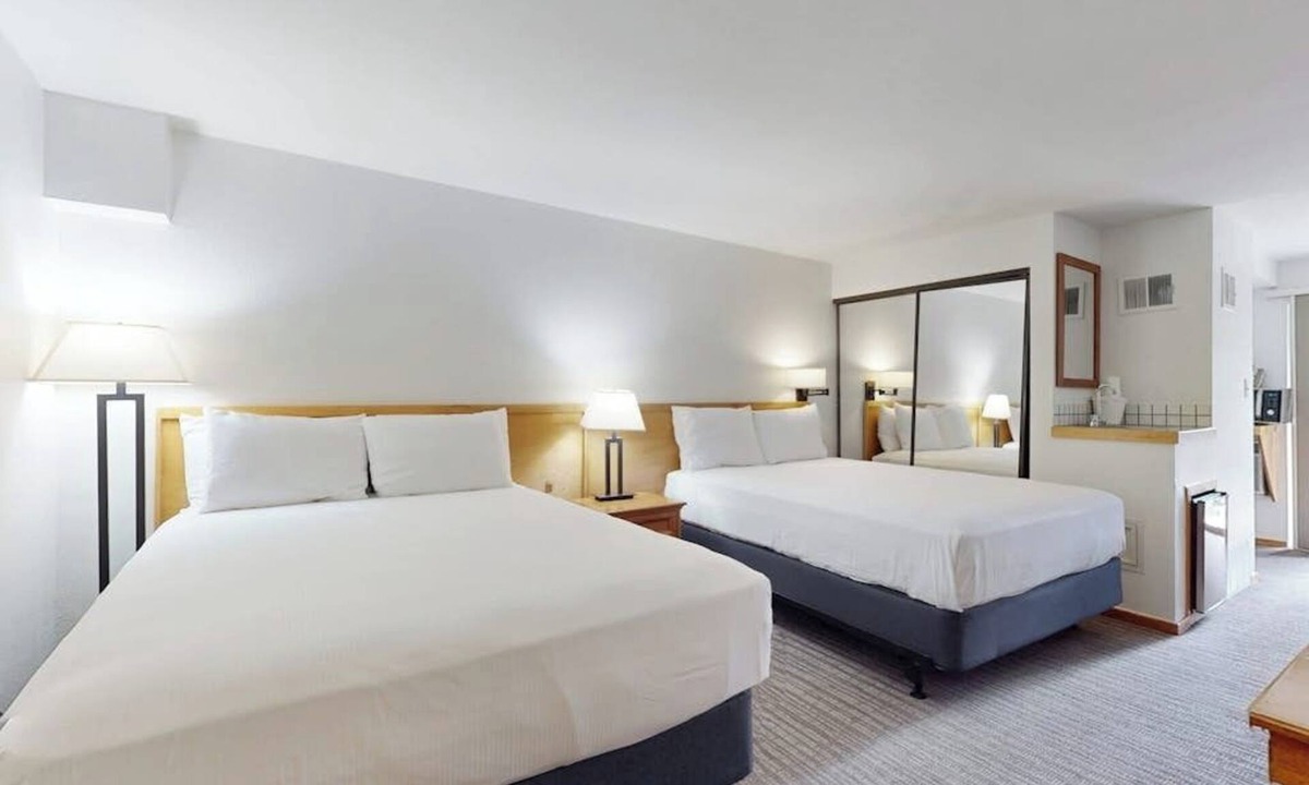 West End Cabin | Main St. studio - pool & hot tub - walk to lifts, dog-friendly, private balcony