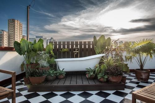 Bagong Lipunan Ng Crame Apartment | MiraNamin Nest GUMAMELA - Family Suite in Historic Home with Indoor Plunge Pool, Garden View, Pet-Friendly, Self-Service Breakfast