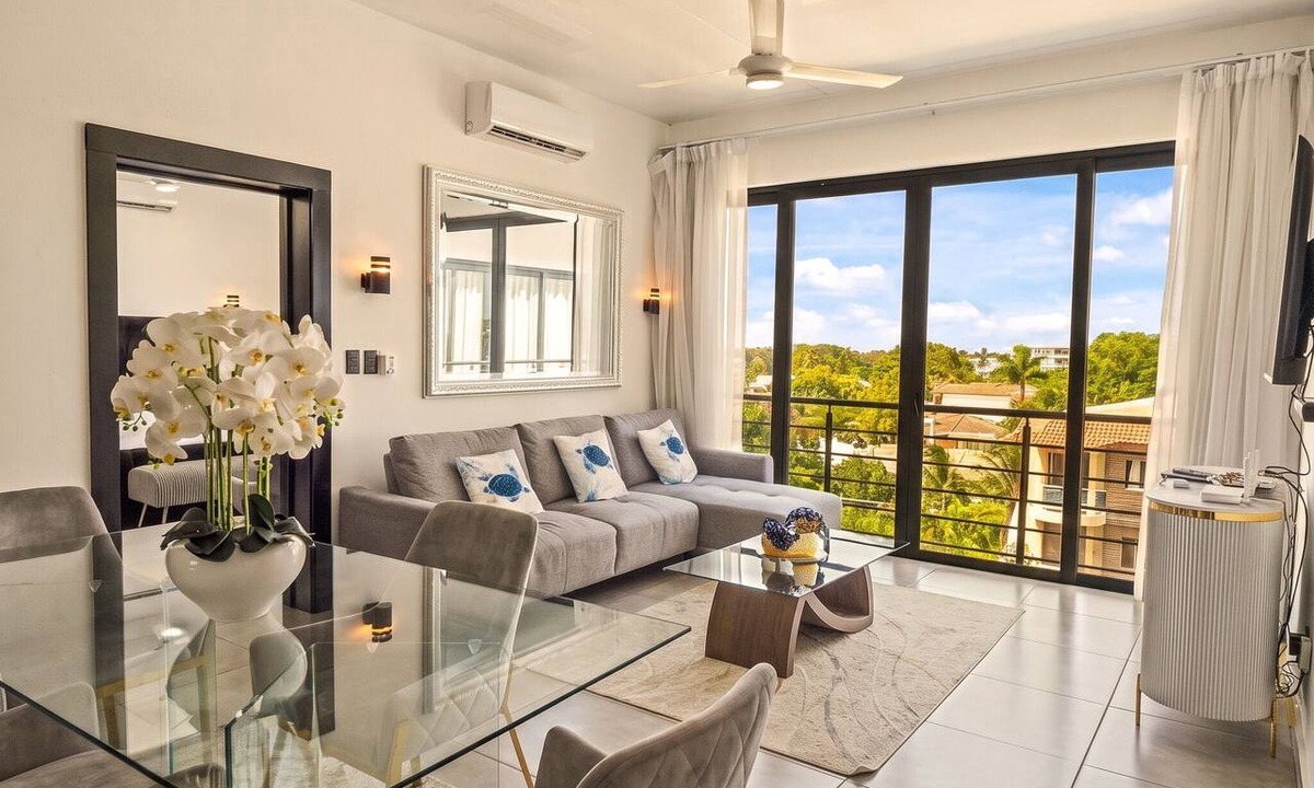 El Batey Apartment | Modern 2BR at Rizz Suites Pool Access Walk to Beach 2 King Beds Sosua