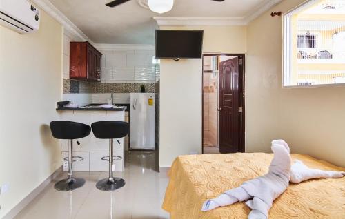 Corales del Sur Apartment | Modern Studio Near Airport Fast WiFi Generator