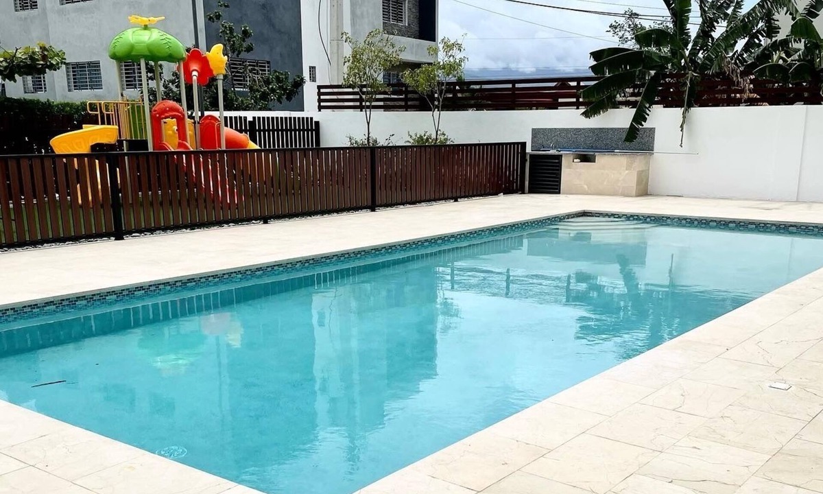 Gregorio Luperon Condo | Safe & Charming private 3-bedroom condo with pool, WiFi, fitness room