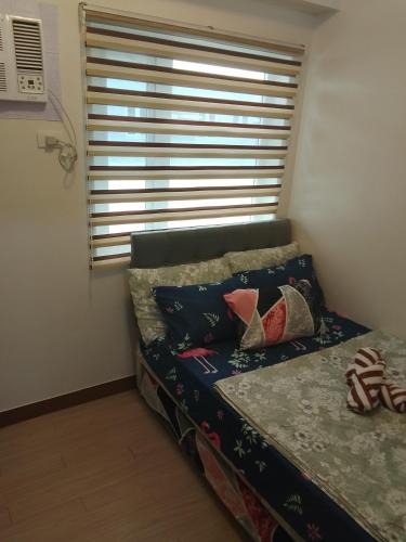 Novaliches Apartment | Trees Residences 1 Bedroom with Netflix and Bluetootth Karaoke Speaker with 2 mini Microphone
