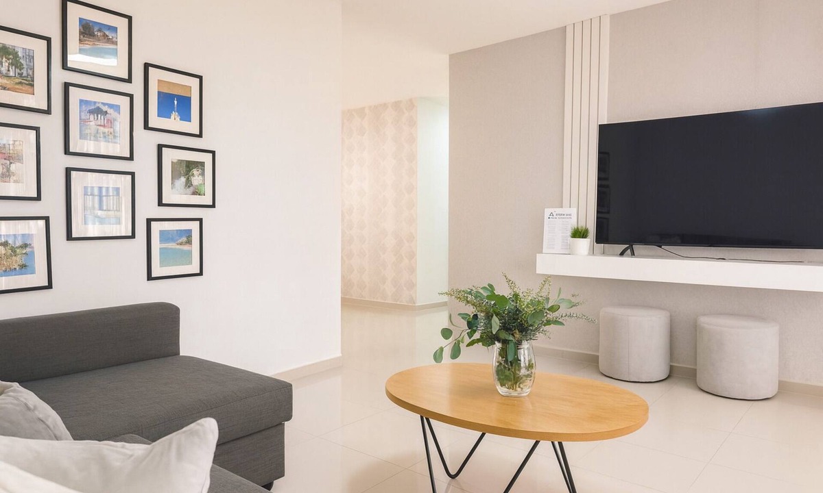 Punal Condo | Unwind in this modern 3-bedroom apartment just 7 minutes from STI Airport and El Monumento. Sleeps up to 10 guests, features a fully equipped kitchen, A/C in every room, smart TV, washer/dryer, and Wi-Fi. Enjoy resort-style amenities including a gym,