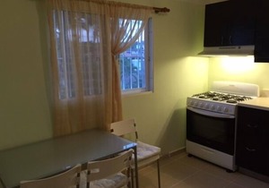 Guest-Friendly 2-bedroom top-floor condo with pool in the center of Sosua