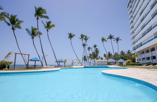 Juan Dolio - El Pueblo Apartment | 14th Floor Modern Ocean, Beach & Pool View Apartment in Juan Dolio