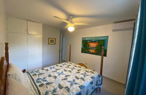 Cofresi Villa | 2 BR & 1WR Suite at Villa Costa Verde near Playa Cofresi, Puerto Plata with a pool, balcony, and a rooftop terrace