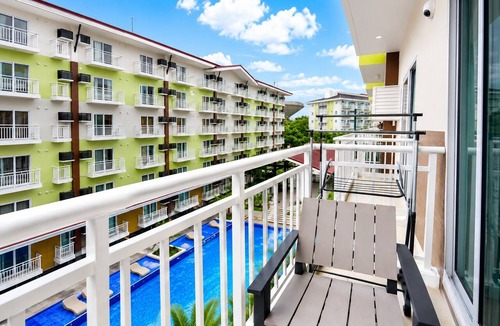Mactan Export Processing Zone Condo | 2 Minutes from Mactan Airport | Free Pool, Gym, Wi-Fi, Netflix & Balcony View