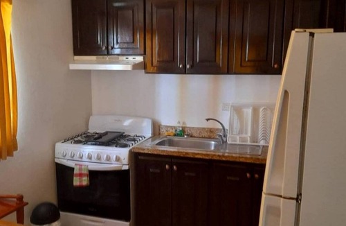 El Batey Apartment | 2BD condo in downtown Sosua, pool/TV/Wi-Fi, near beach/clubs, guest-friendly