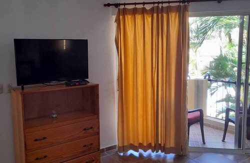El Batey Apartment | 2BD condo in downtown Sosua, pool/TV/Wi-Fi, near beach/clubs, guest-friendly