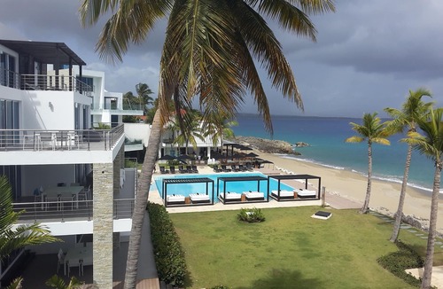 El Batey Apartment | 3BD luxury beachfront condo with gym, elevator, infinity pool. Reduced rate!