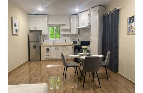 Los Maestros Apartment | A charming place surrounded by trees.
