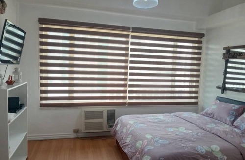 Ermita Night District Apartment | Alpha Grande View