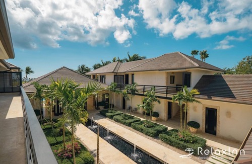 Punta Cana Villa | Arrecife 55 - Dramatic luxury villa with golf and ocean view