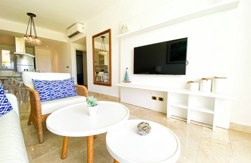 Bavaro Apartment | Awesome 2-Bedroom Apartment with a Pool View & Balcony - Golf Course in Front