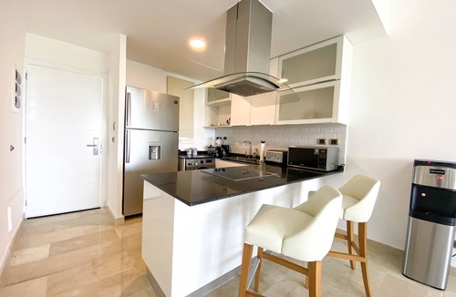 Bavaro Apartment | Awesome 2-Bedroom Apartment with a Pool View & Balcony - Golf Course in Front