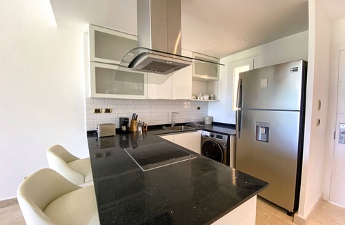 Bavaro Apartment | Awesome 2-Bedroom Apartment with a Pool View & Balcony - Golf Course in Front