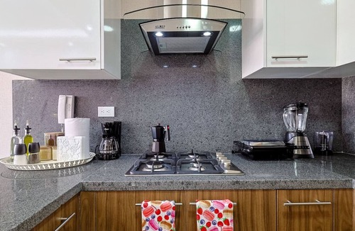 Evaristo Morales Apartment | Beautiful and Cozy 1BR Centric Condo, Full AC, King Bed, Pool, Fast Wi-Fi