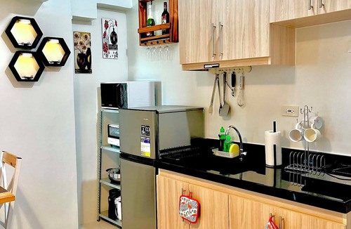 Tagbilaran Condo | Brand new condo with free access to parking 5 minute walk to white sand beach