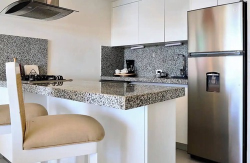 Guayacanes Apartment | Caribbean Sunscape Beachfront Apartment