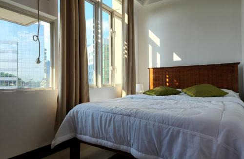 Pinagsama Apartment | Casa Antonio at Stamford McKinley Hill Unli Wi-Fi Near Piazza
