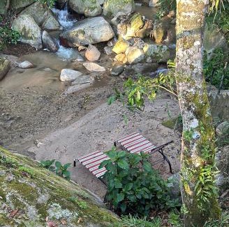 Jarabacoa House | Casa del Arroyo 2-Bedroom Cottage Fireplace and BBQ