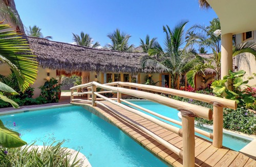 Las Terrenas Villa | Casa La rodonda: 9 bedroom beachfront on spectacular sunset location.