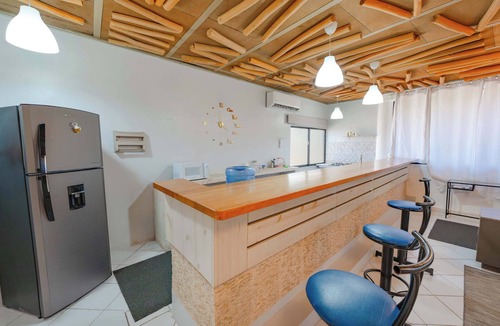 El Batey Apartment | Centric Studio in Sosua Center Pool & Workspace