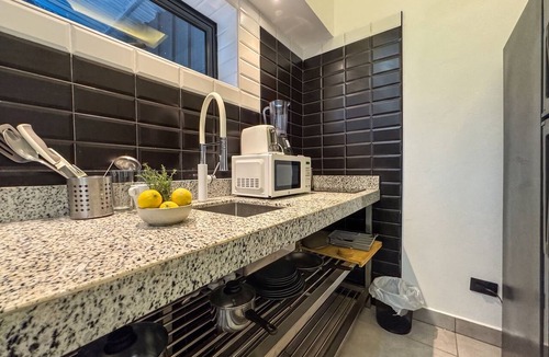 El Batey Apartment | Cozy 1BR suite at Rizz Suites – GYM, Pool, A/C & Walk to Beach