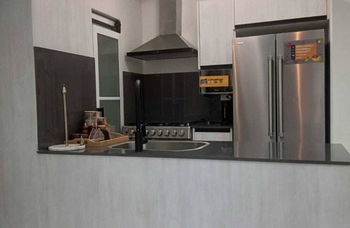 Ensanche Quisqueya Condo | Cozy 2-bedroom condo with AC and Pool in beautiful Santo Domingo