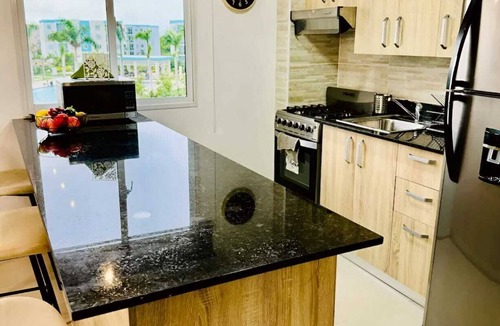 Veron Apartment | Cozy 2BR Retreat w/Pool, WiFi, Parking – Minutes to Beach