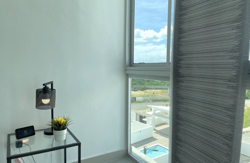 Guaricano Apartment | Cozy Apartment with Pool View 10 minutes USA Embassy
