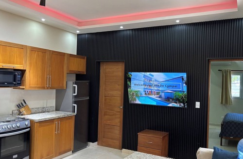 Villas Ana Maria Condo | Downtown Sosua One Bedroom Condo with onsite Bar and Cigar Lounge.
