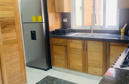 Urbanizacion Tavarez Apartment | Elegant 2BR/2BA condo: unwind by the pool. Guest-friendly, near all