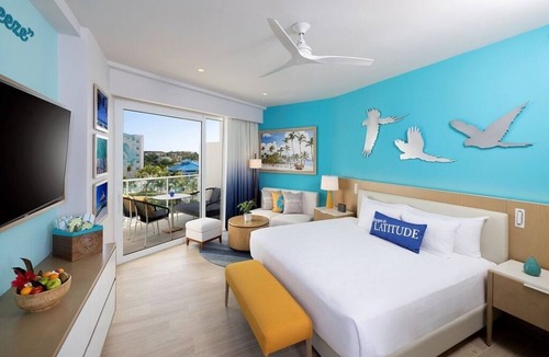 Punta Cana Hotel | Elegant Art Suite: Freestanding Tub, Rainforest Showers, and Premium Benefits