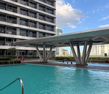 Highway Hills Apartment | Elevated retro condo near BGC, Makati, and Ortigas