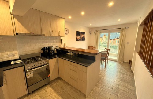 San Martin de los Andes Condo | Enjoy with your family the best view of the waterfall I Ayres del Bosque Accommodations