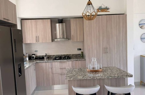 San Pedro de Macoris Apartment | Fantastic 2-bedroom apartment with AC Social area in guayacanes