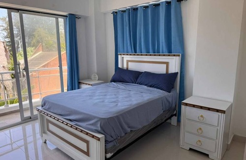 San Pedro de Macoris Apartment | Fantastic 2-bedroom apartment with AC Social area in guayacanes