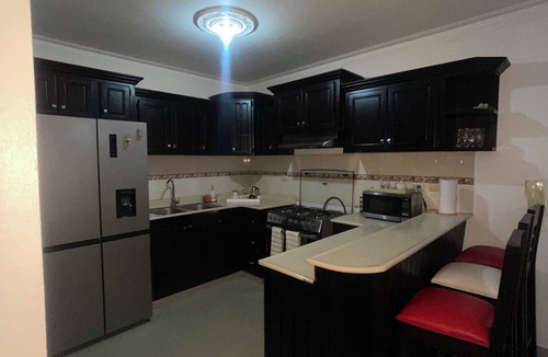 Gregorio Luperon Apartment | Gated residential apartment, 2 bedrooms and two bathrooms. 24/7 security