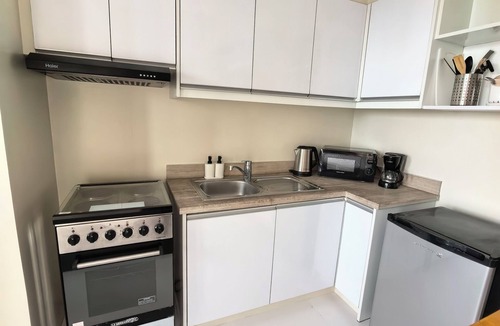Legazpi Village Condo | Isla Room by Lakbay Urban Living
